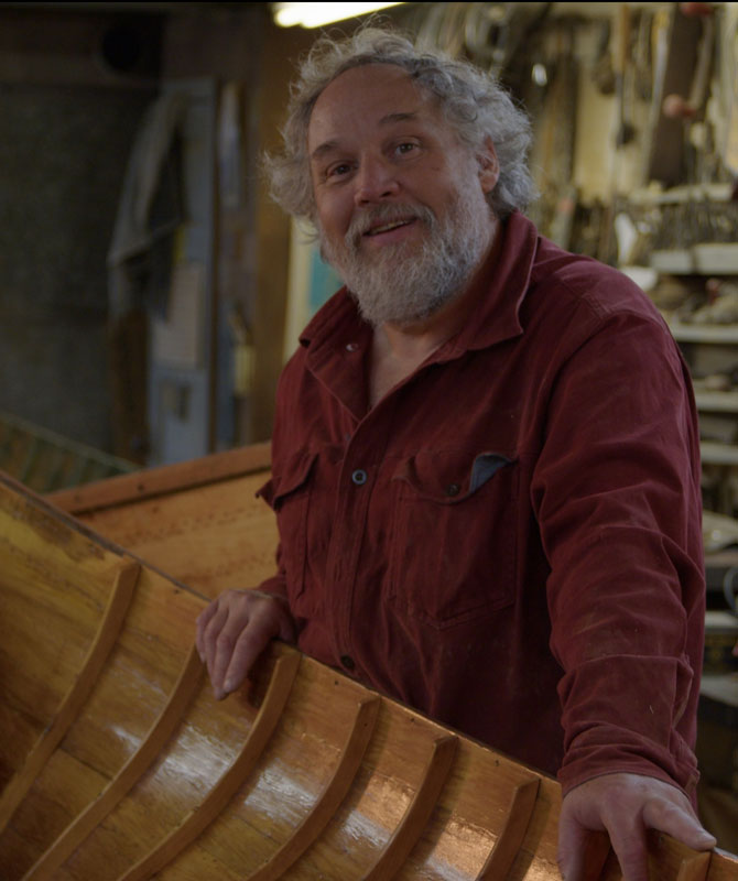Chris Woodward Smiling in his Adirondack Guideboat Shop