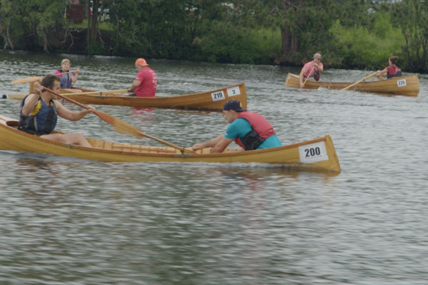 Guideboats being rowed in Hamner Guideboat Race